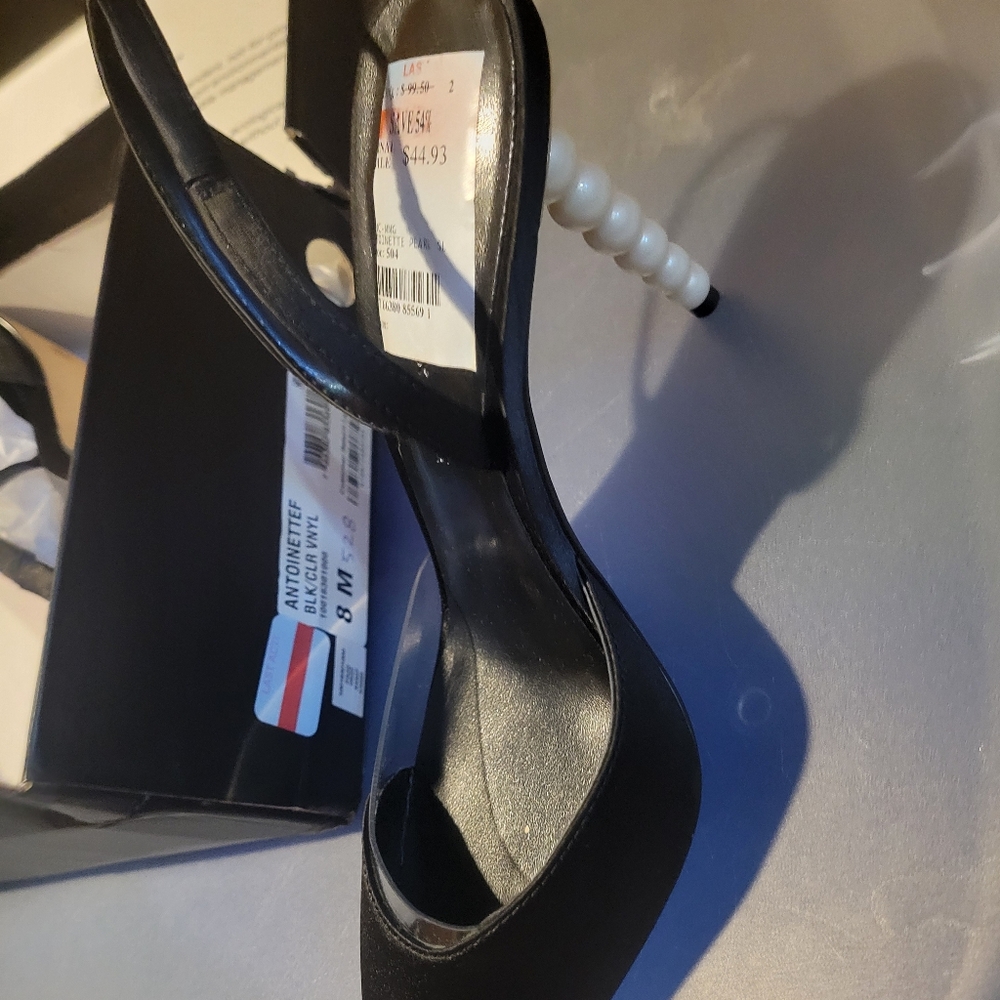 Black Sling back with peal heal